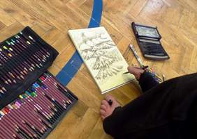 Pokaż zdjęcie: Spotkanie uczniów Szkoły Podstawowej z Oddziałami Integracyjnymi nr 12 w Krakowie z artystą Stanisławem Kmiecikiem