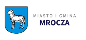 Herb Miasta i Gminy Mrocza - na błękitnej tarczy herbowej z czarną krawędzią zewnętrzną, biała owca skierowana w  prawą stronę