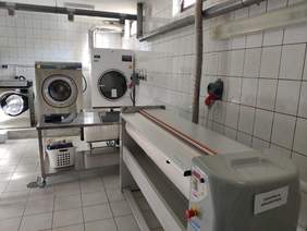 Pokaż zdjęcie: Wyposażenie pralni