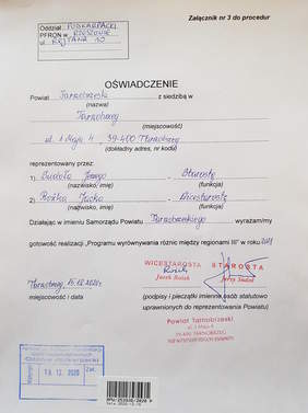 zdjęcie dokumentu, oświadczenia powiatu o gotowości przystapienia do programu, opatrzone podpisami i pieczątkami starosty i wicestarosty i pieczęcią powiatu