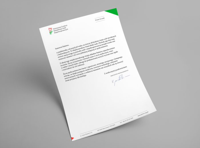 Na kartce papieru firmowego z logo PFRON napisane są życzenia