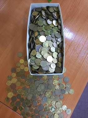 Pokaż zdjęcie: Grosiki uzbierane na rzecz WOŚP