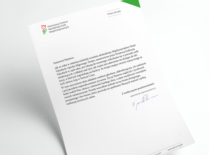 Kartka papieru z logo PFRON, na której napisane są życzenia