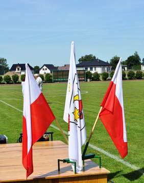 Flagi Polski i flaga z herben Kowalewa Pomorskiego