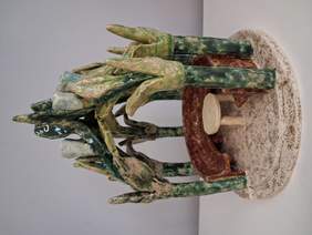 Pokaż zdjęcie: Rzeźba przedstawiajaca pergolę w kolorze zielonym