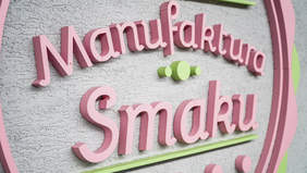 Napis Manufaktura Smaku